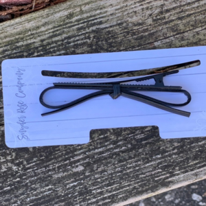 Large Sleek black faux leather bow clip